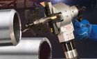 Pipe beveling machine sets up easily and cuts super alloys