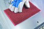 Hand pads permit cost effective manual cleaning