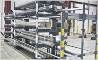 At Electralloy’s new facility, a conveyor and racking system makes storing steel safer